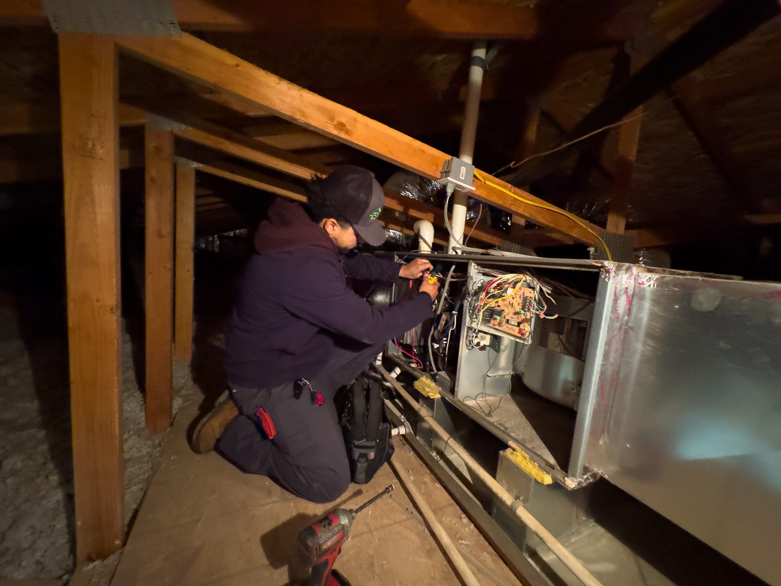 Balanced Comfort technician performing a heating system tune-up