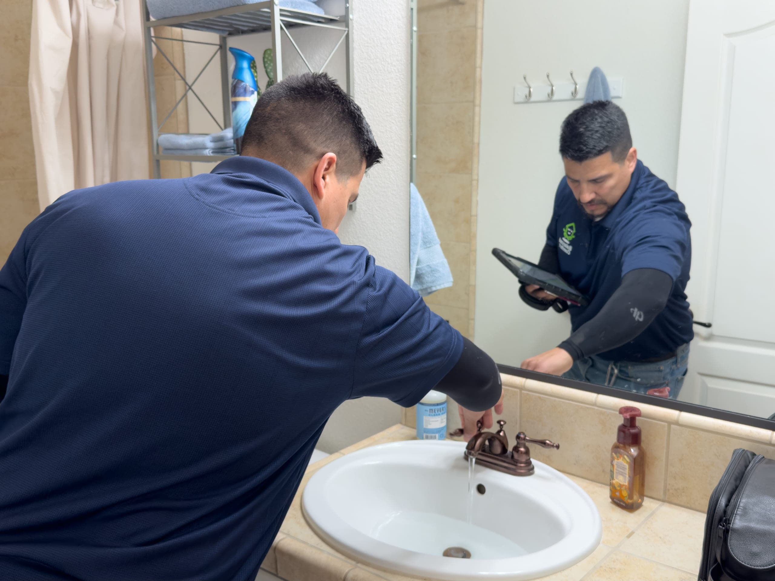 Balanced Comfort plumber performing a whole-home plumbing inspection