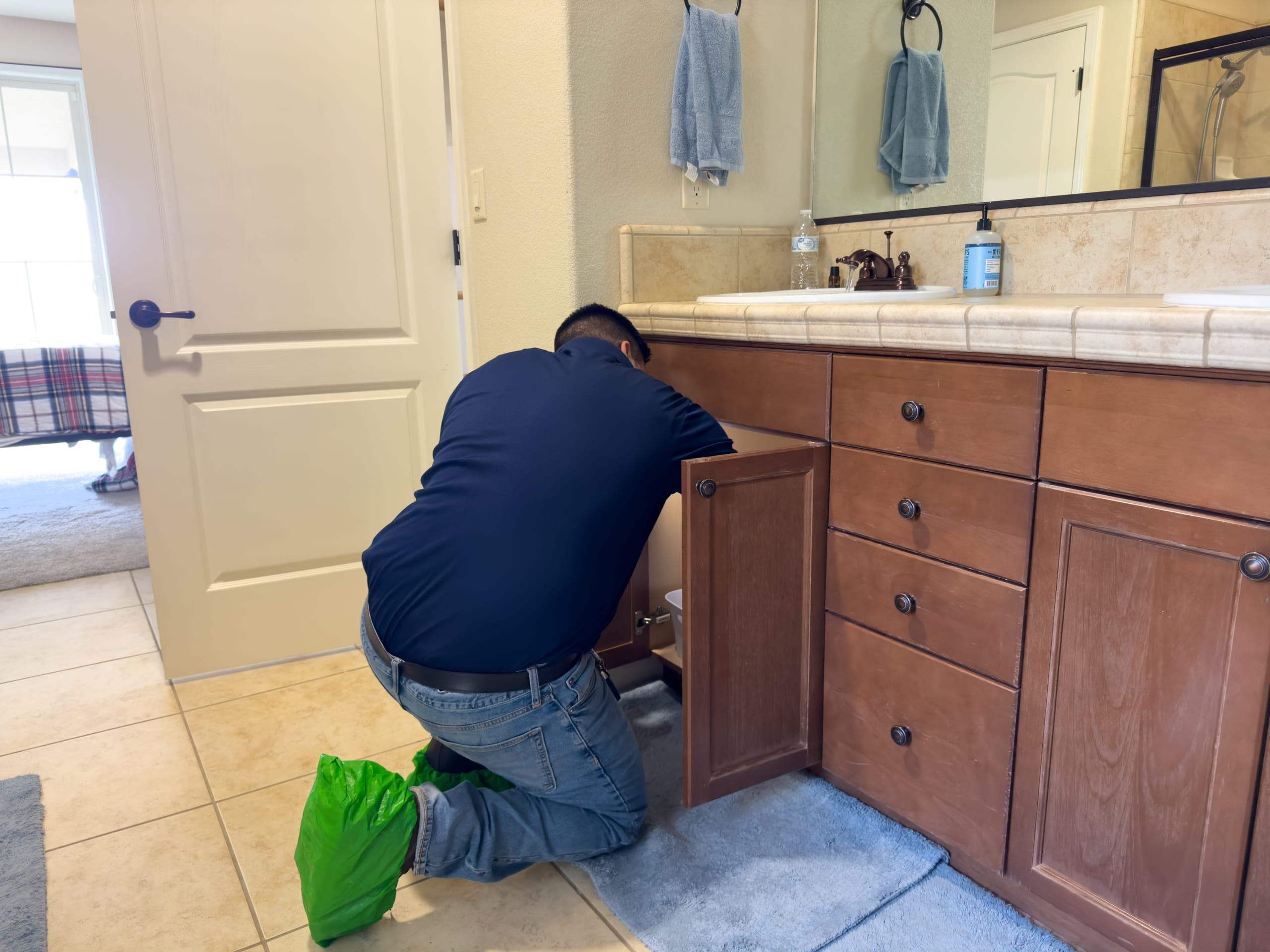 Balanced Comfort plumber repairing a commercial water leak