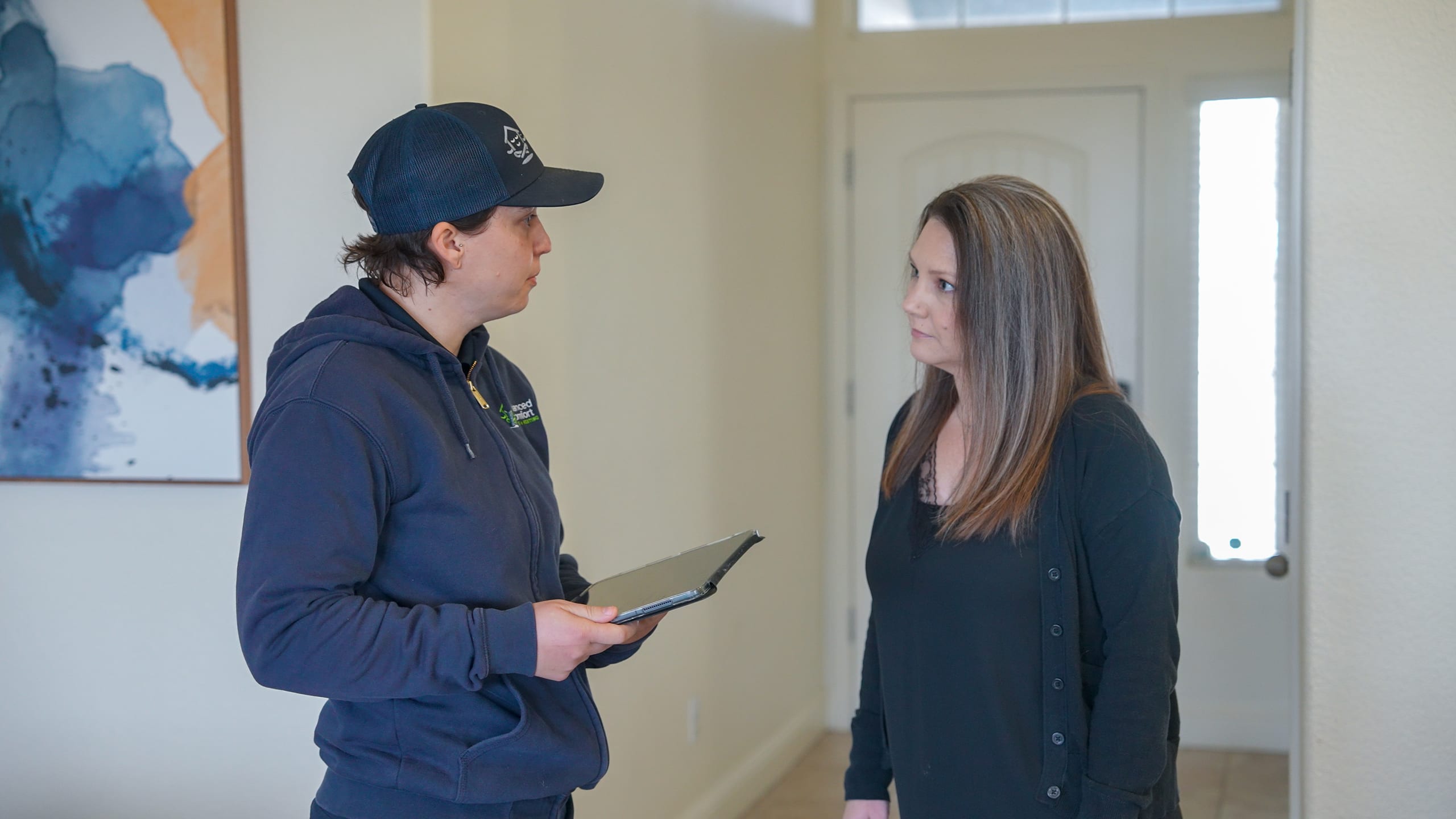 Balanced Comfort technician talking with a customer