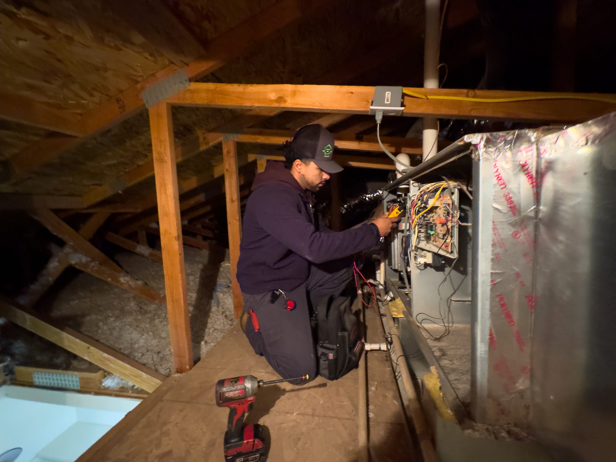 Balanced Comfort technician diagnosing a heating system